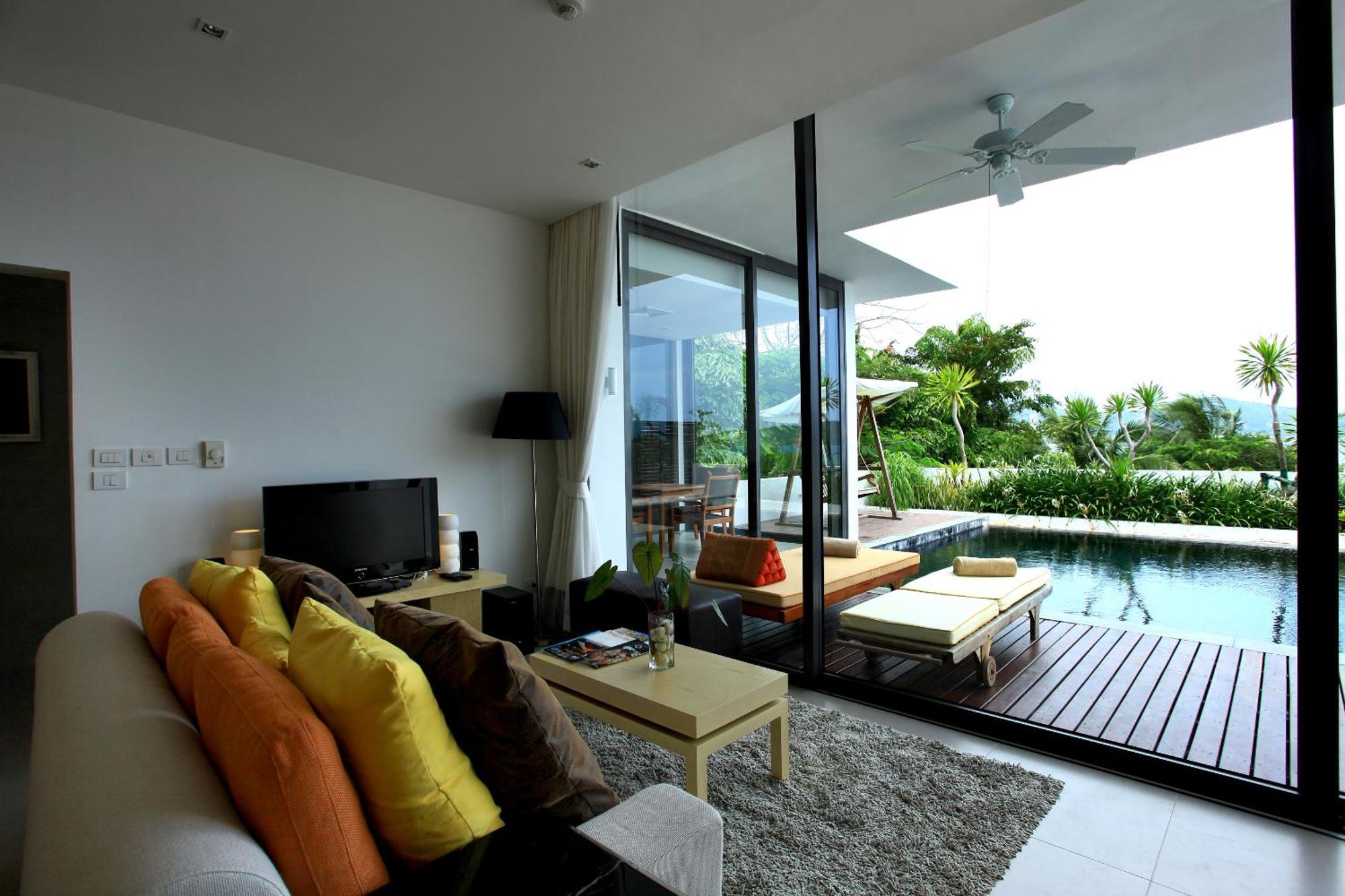 Indochine Resort And Villas - Sha Extra Plus Patong Екстер'єр фото A living room with a view of the pool